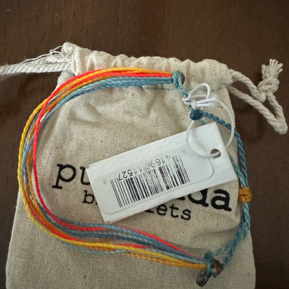Pura Vida rainbow bracket orange red blue yellow. Brand new.